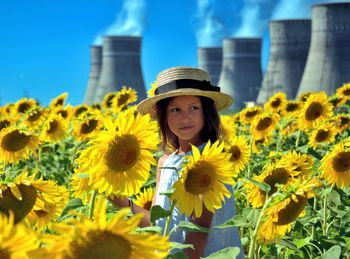 Portrait of woman with yellow flowers