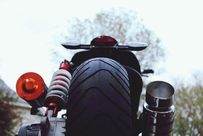 Low angle view of bicycle against sky