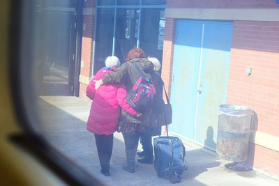 Young woman standing on slide