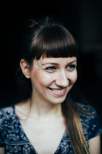 Portrait of a smiling young woman