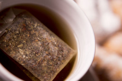 Close-up of teabag in cup