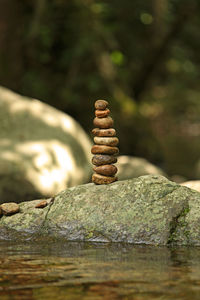 Close-up of stone stack on rock