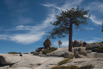 Rock formations on landscape against sky