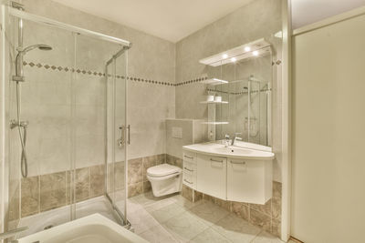 Low angle view of shower head in bathroom