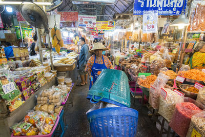 Group of people at market stall