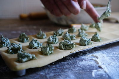 Close-up of person preparing food