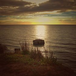 View of calm sea at sunset