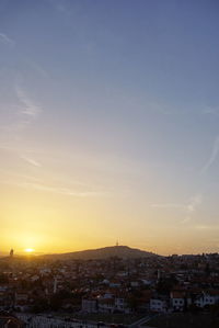 High angle view of townscape against sky during sunset