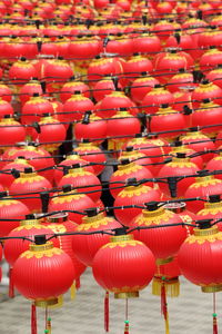 Red balloons in row