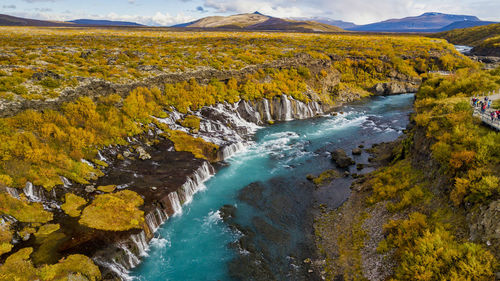 Autumn afternoon at hraunfossar waterfall in iceland