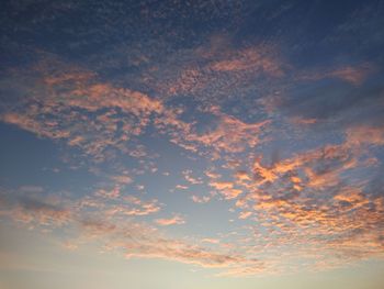 Low angle view of dramatic sky during sunset