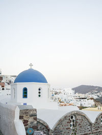 Oia, santorini blue church against clear sky