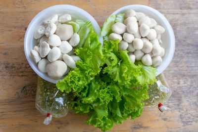 High angle view of pills in bowl on table