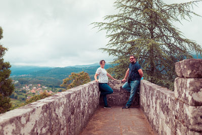 Portrait of couple standing at observation point