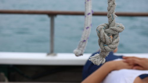 Close-up of rope tied on boat