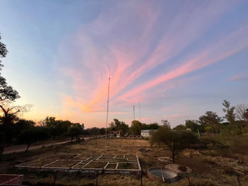 Scenic view of landscape against sky during sunset