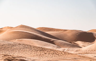 Scenic view of desert against clear sky