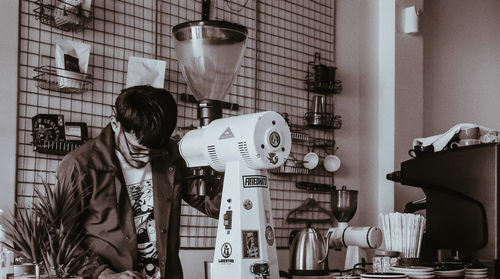 Full length of man working on table