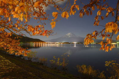 Scenic view of lake against sky during autumn