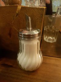 Close-up of drink in jar on table