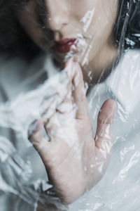 Close-up of woman holding hands