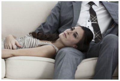 Woman lying on lap at home