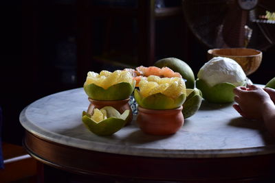 Close-up of fruits in plate on table
