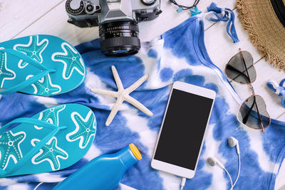 High angle view of mobile phone on table