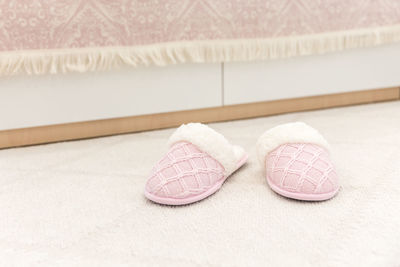 Close-up of shoes on table