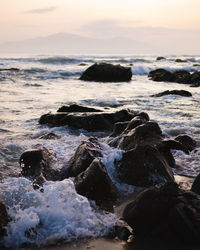 Scenic view of sea against sky during sunset