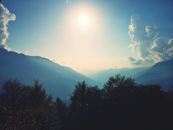 Scenic view of silhouette mountains against sky