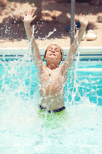 Man swimming in pool