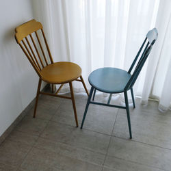 High angle view of two empty chairs at home