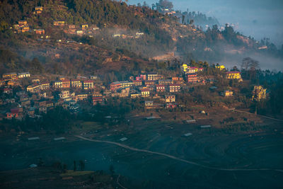 High angle view of townscape and trees in city