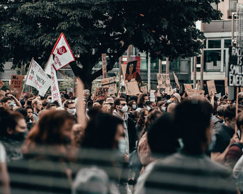 Group of people at street in city