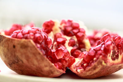 Close-up of pomegranate against white background