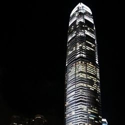 Low angle view of modern building at night