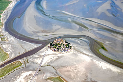 High angle view of people swimming in sea