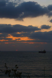 Scenic view of dramatic sky over sea