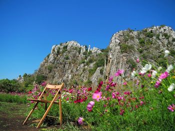 Scenic view of mountains against clear blue sky