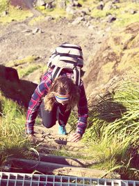 Full length of woman in grass