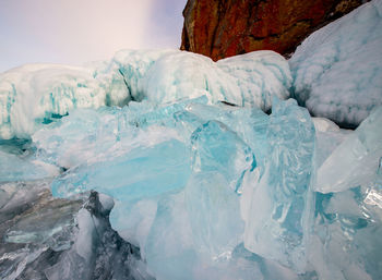 Scenic view of frozen lake against sky