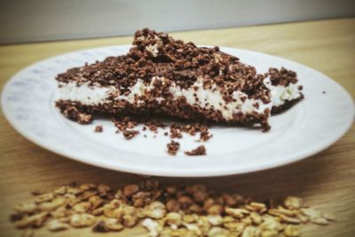 Close-up of cake served in plate on table