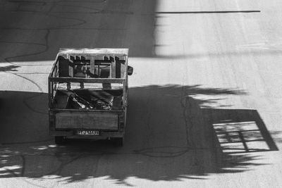 Close-up of vintage car on road