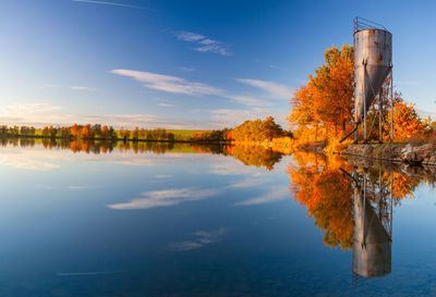 Scenic view of lake against sky during autumn