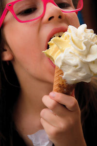 Midsection of woman holding ice cream