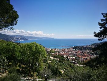 Scenic view of sea against blue sky