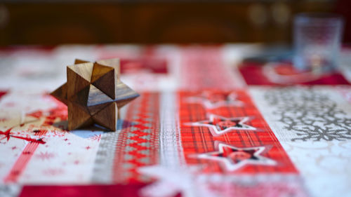 Close-up of umbrella on table