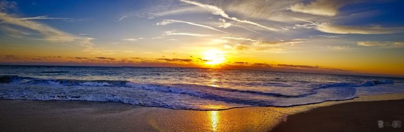 Scenic view of sea against sky during sunset