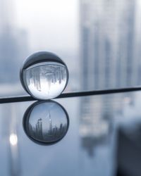 Close-up of crystal ball on water